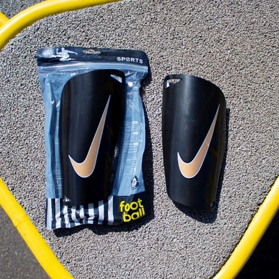 Футбольні щитки Nike (чорний) 518-L фото